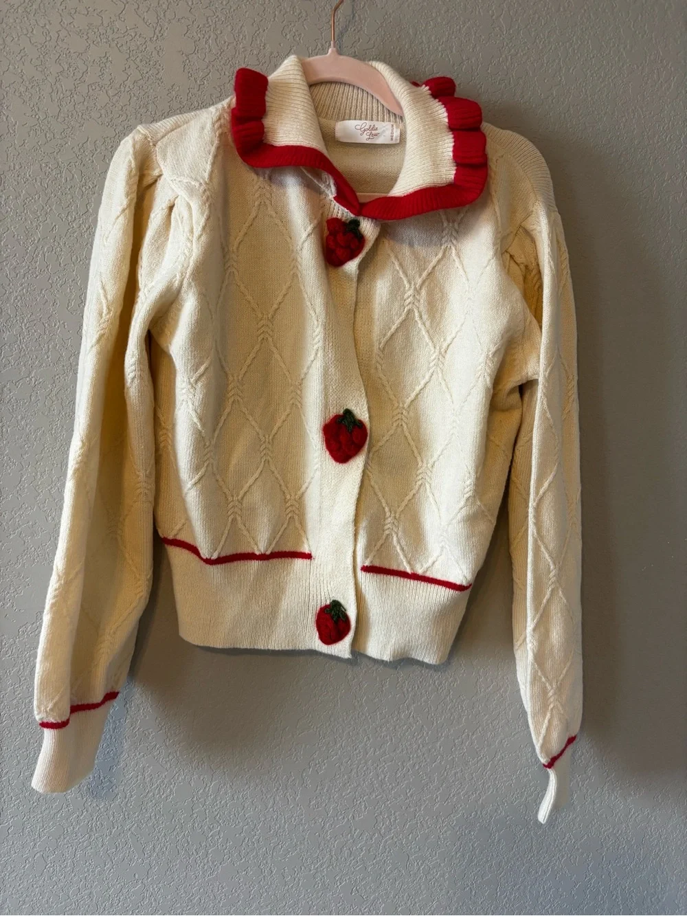 Goldie Cream Knit Cardigan with Red Trim and Strawberry Buttons - Picture 3 of 5